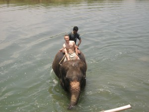Elephant bath, moments before the elephant shake me off into the river