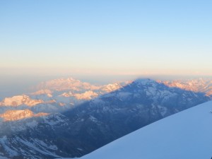 Sunrise shadow of Elbrus on the valley