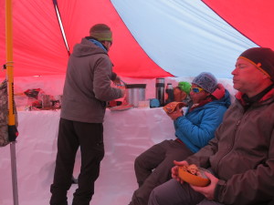 Eating inside of our "Mid" (Kitchen tent) on Denali